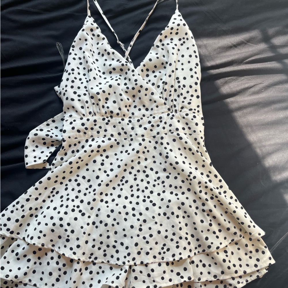 Black and white polk a dot romper from main strip!